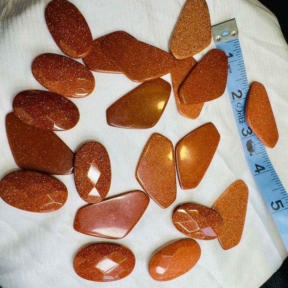 Lot of large reddish goldstone gemstones, perfect for jewelry making